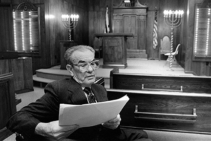 Max Lewin preparing to read the names for Beckley's first Holocaust
Remembrance Day in 1991
